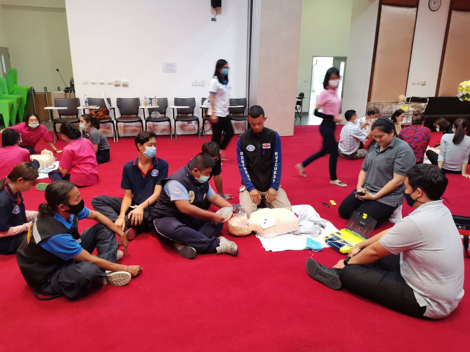 Rescue volunteers demonstrate CPR and airway management
