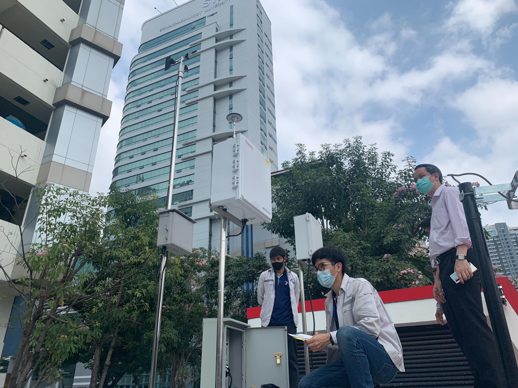 ECE SWU staff and technicians installed the air quality monitoring station and final check before launching the SWU AQI.